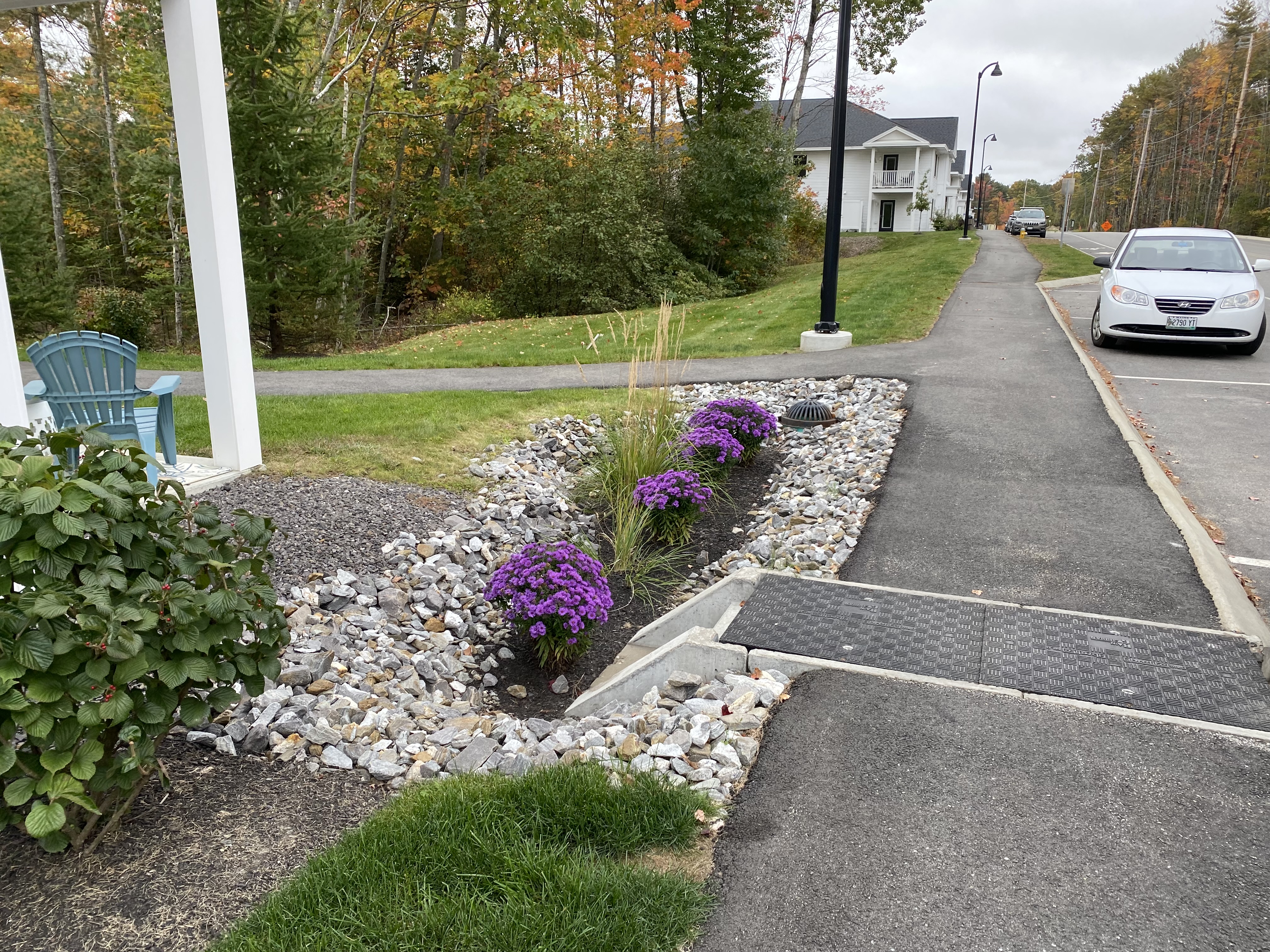 Rain Guardian Foxhole installed spanning a bituminous walkway