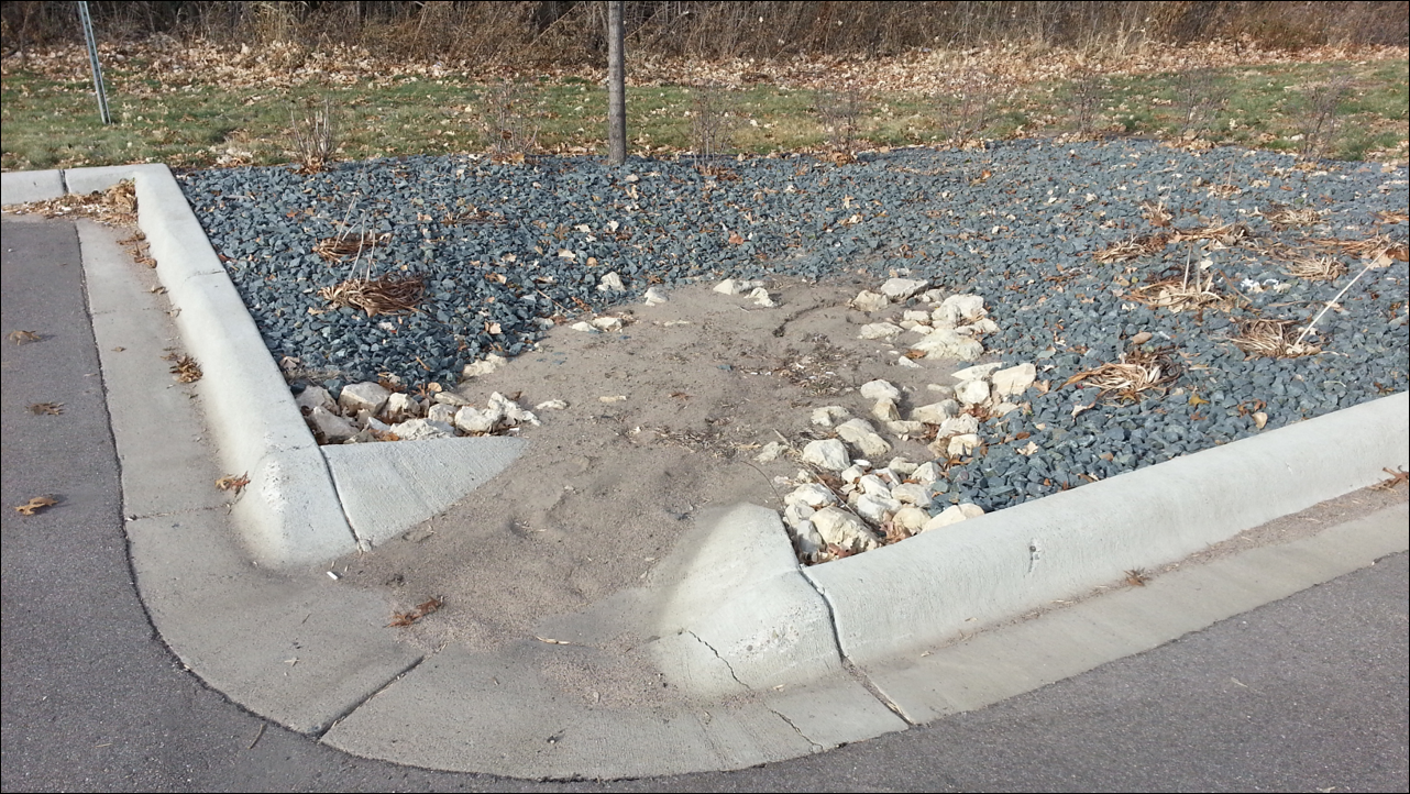 Significant sediment accumulation within rock riprap inlet