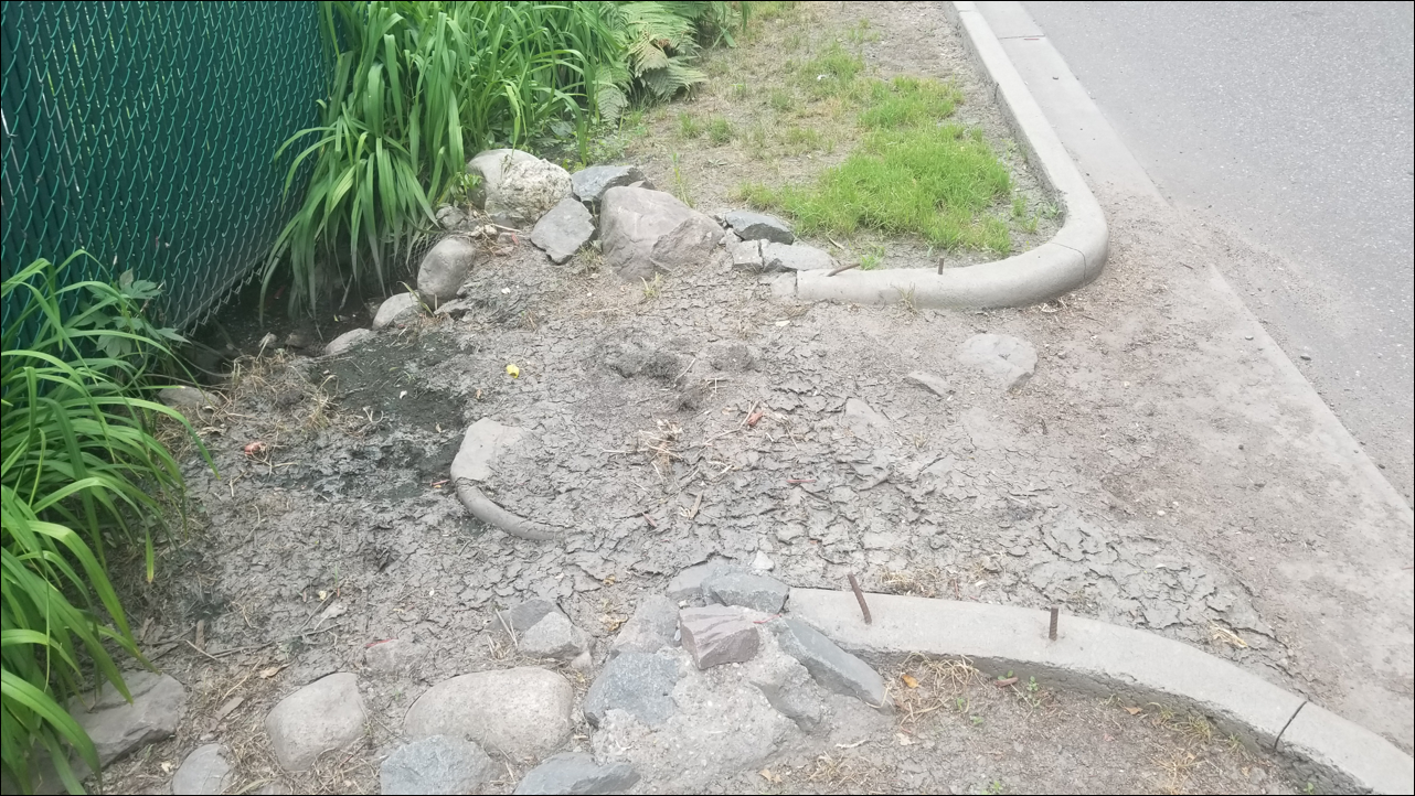 Significant sediment accumulation at rain garden inlet