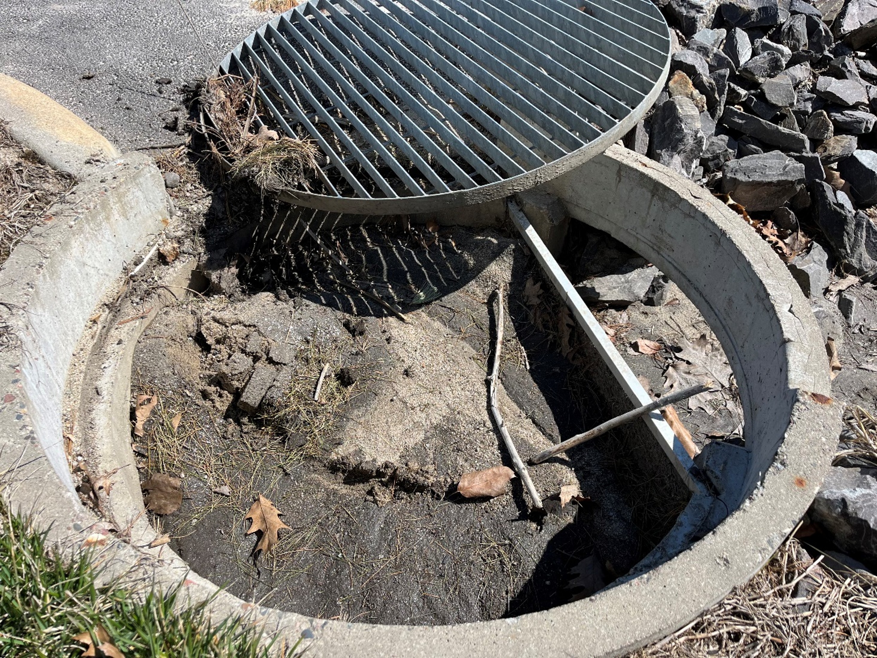 Rain Guardian Turret with the top grate pulled aside revealing sediment capture within the chamber